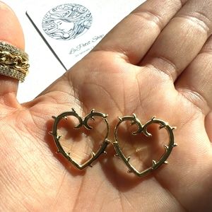 Thorny heart-shaped hoop earrings. They are beautiful.